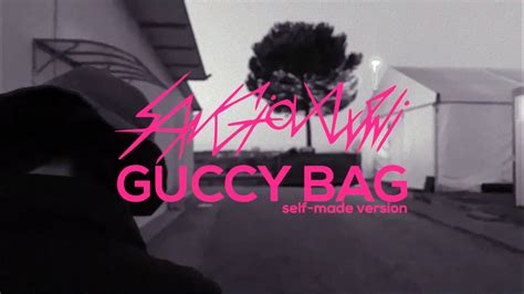 The story and meaning of the song 'Guccy Bag 